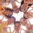 40534794 - friendship, youth, gesture and people - group of smiling teenagers in circle showing victory sign